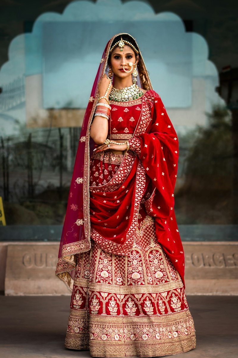 Zeenat Lehenga 3 Piece Embroidered Net Suit in Rani